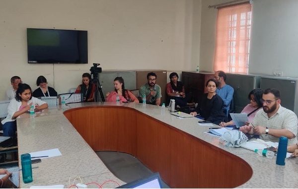 Participants in discussion with the presenters at the panel.